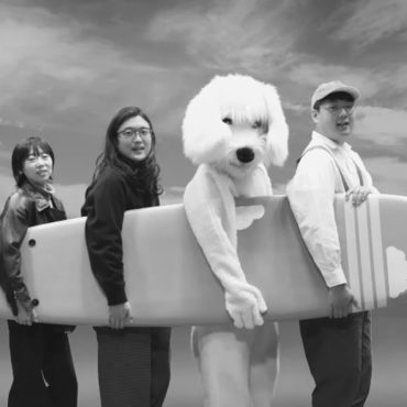 say-sue-me-go-land-surfing-with-a-giant-dog-in-the-video-for-new-song-“to-dream”