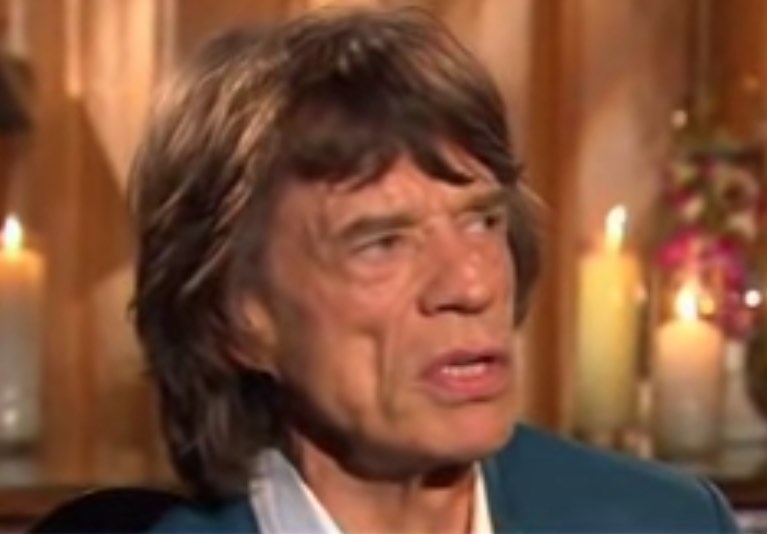 mick-jagger-spotted-with-young-singer-in-dressing-room