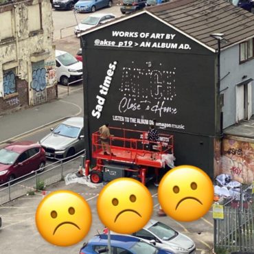 aitch-apologizes-for-album-promo-painting-over-manchester’s-ian-curtis-mural