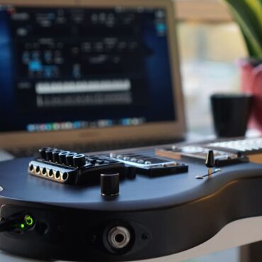 jamstik-studio-review:-an-innovative-midi-controller-disguised-as-a-travel-friendly-guitar