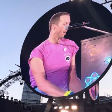 watch-coldplay-cover-“rocket-man,”-beam-a-message-across-sweden-to-elton-john’s-farewell-tour-closer