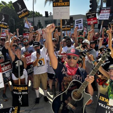 watch-tom-morello-perform-for-picketing-writers-and-actors-in-hollywood