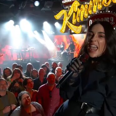 watch-st.-vincent-charge-through-the-crowd-while-singing-“broken-man”-on-kimmel